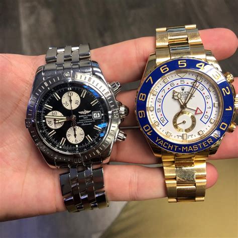 breitling vs rolex value